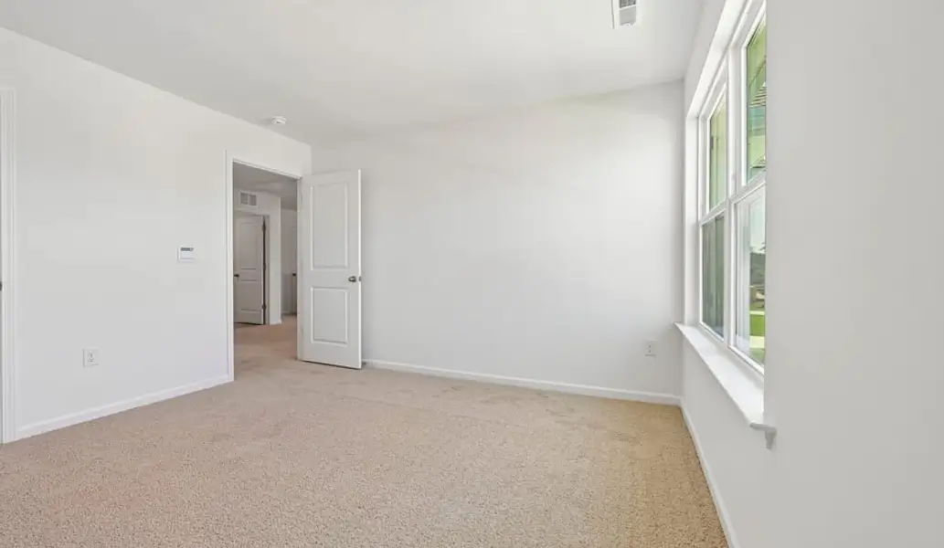 Spacious, unfurnished interior of a new home in Shahbain Reserve, Raeford (Image 28). Spacious, unfurnished interior of a new home in Shahbain Reserve, Raeford (Image 28).