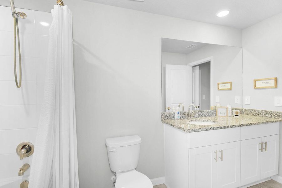 Furnished interior view inside a new home in Edgewater Pointe, Stuart (Image 18).