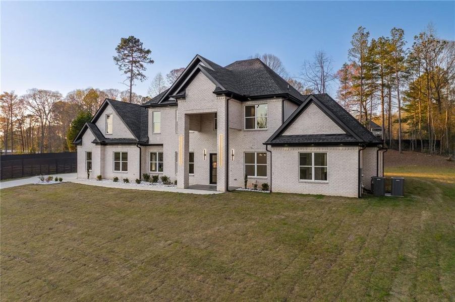 Front exterior of a new home in , Loganville, GA, highlighting curb appeal (Image 30).