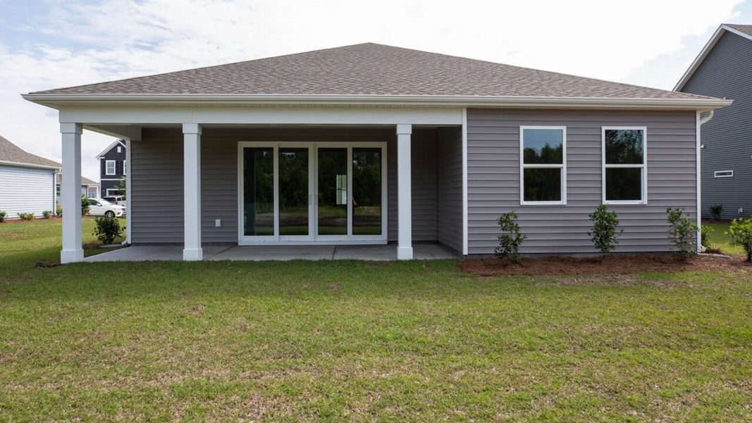 Exterior details and patio area of a home in Grayson Park, Leland (Image 3).