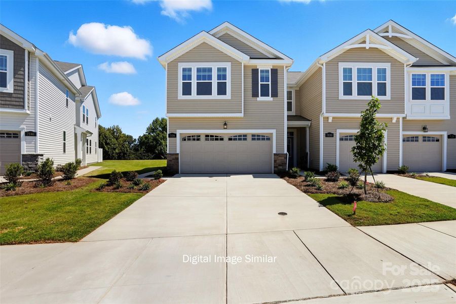 Front exterior of a new home in Bailey Run, Charlotte, NC, highlighting curb appeal (Image 17). Front exterior of a new home in Bailey Run, Charlotte, NC, highlighting curb appeal (Image 17).