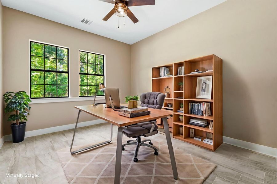 Bedroom virtually staged as office. Bedroom virtually staged as office.