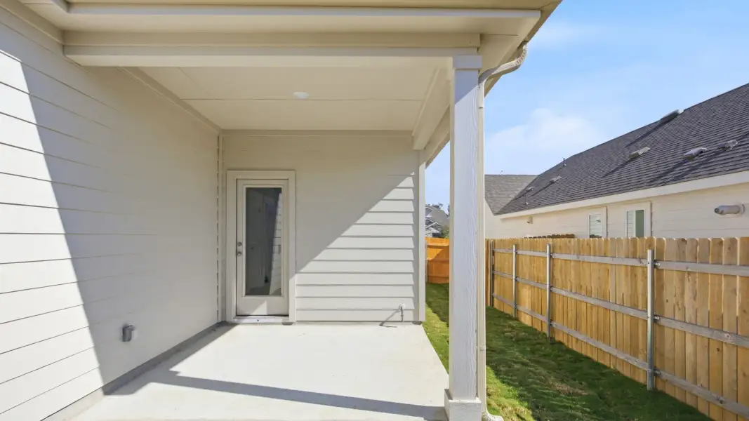 Exterior details and patio area of a home in Creeks Crossing, Elgin (Image 24).