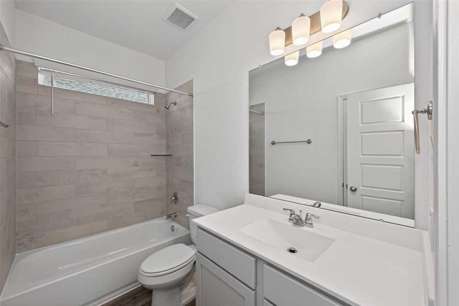 Furnished interior view inside a new home in Enclave at Willis, Willis (Image 13).