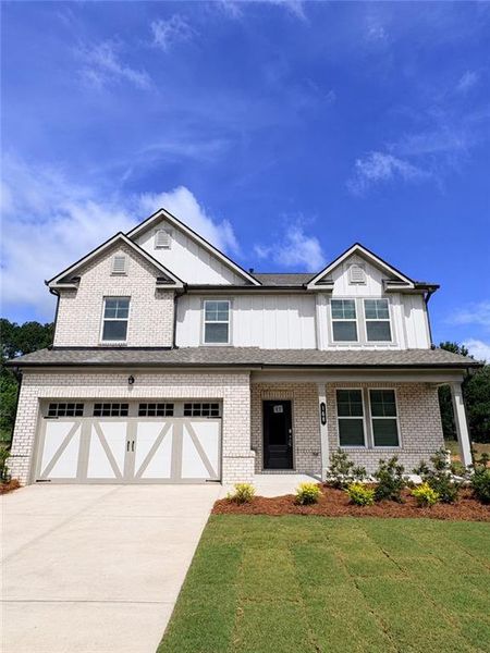 Front exterior of a new home in Lake Shore, Winder, GA, highlighting curb appeal (Image 1). Front exterior of a new home in Lake Shore, Winder, GA, highlighting curb appeal (Image 1).