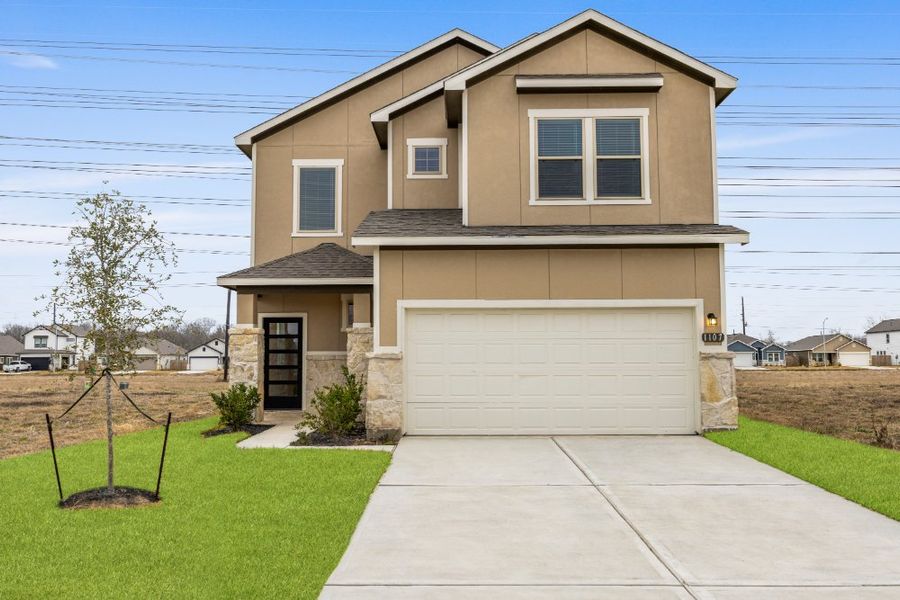 Front exterior of a new home in Glendale Lakes, Rosharon, TX, highlighting curb appeal (Image 33). Front exterior of a new home in Glendale Lakes, Rosharon, TX, highlighting curb appeal (Image 33).