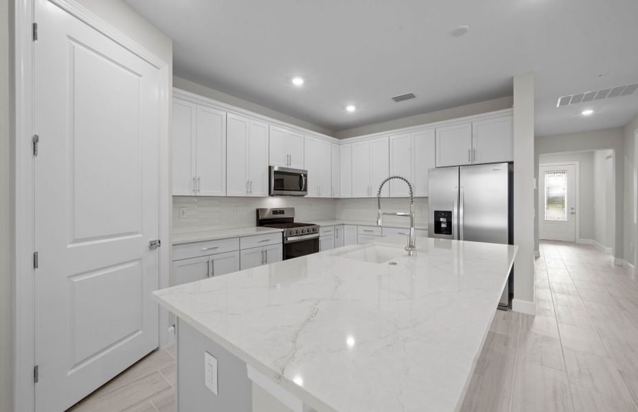 Furnished interior view inside a new home in Del Webb Oak Creek, North Fort Myers (Image 10).