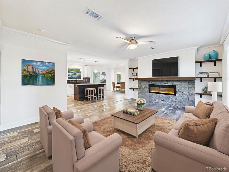 Virtually Staged Virtually Staged version highlights space for sofa seating, TV above the fireplace, and stylish accents.