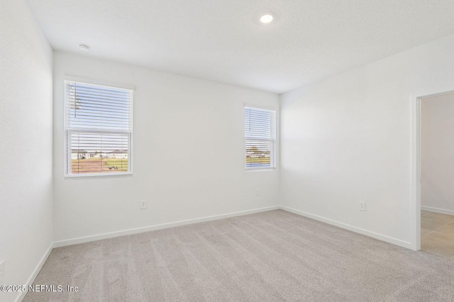 Spacious, unfurnished interior of a new home in Lakes at Bella Lago - Signature Series, Green Cove Springs (Image 25). Spacious, unfurnished interior of a new home in Lakes at Bella Lago - Signature Series, Green Cove Springs (Image 25).