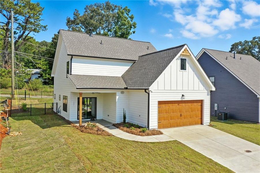 Front exterior of a new home in , Emerson, GA, highlighting curb appeal (Image 17).