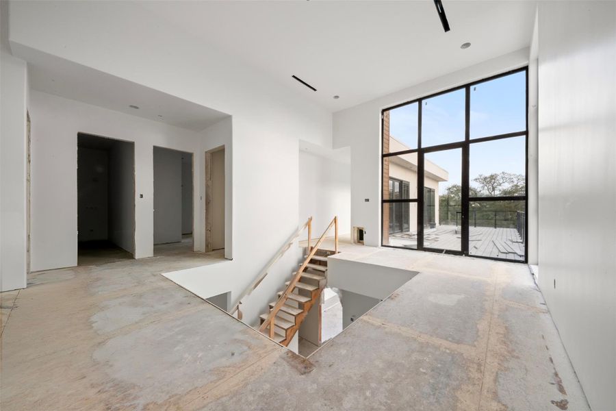 Perspective from the second floor landing from the master bedroom entry. With access to the west large balcony.