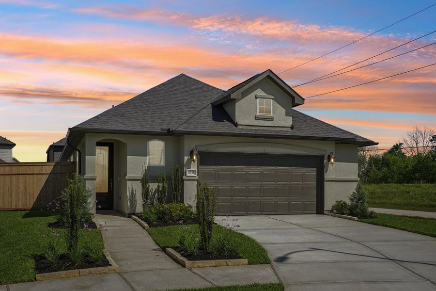 Front exterior of a new home in Sienna 40', Missouri City, TX, highlighting curb appeal (Image 19).