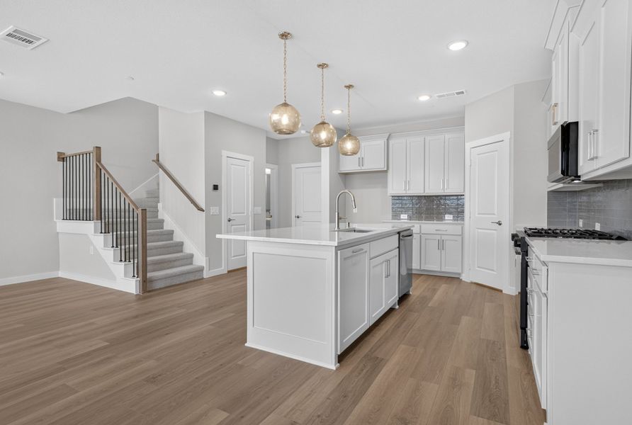 Furnished interior view inside a new home in The Tribute, The Colony (Image 11).