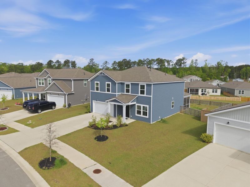 Front exterior of a new home in Bradford Pointe, Summerville, SC, highlighting curb appeal (Image 21).