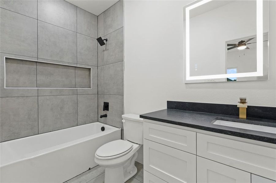 Bathroom with shower / tub combination and vanity Bathroom with shower / tub combination and vanity