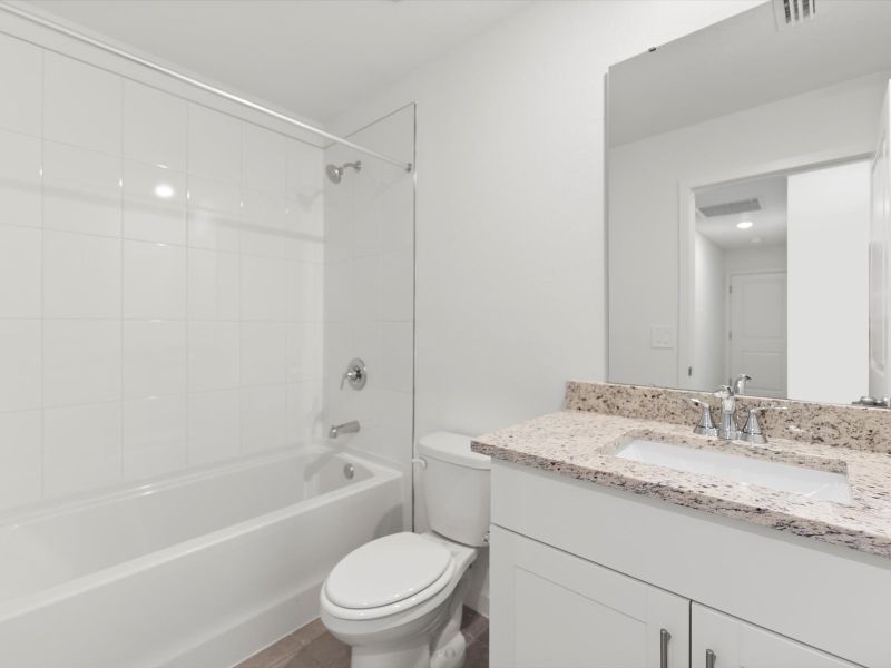 Furnished interior view inside a new home in Flagler Village - Classic Series, Palm Coast (Image 7).