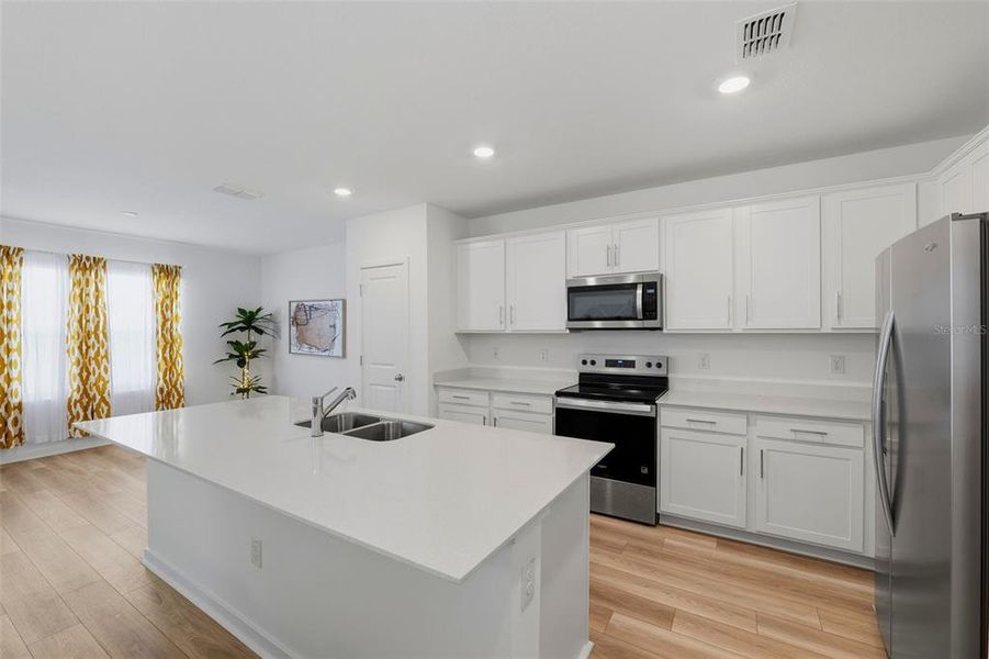 Furnished interior view inside a new home in Oakfield Lakes, Parrish (Image 38).