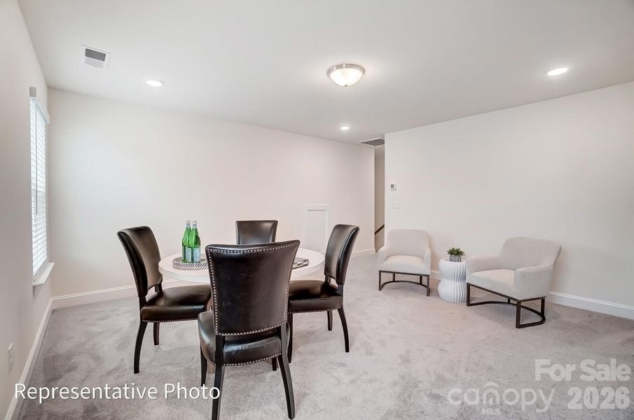 Furnished interior view inside a new home in Heritage - 55+ Community, Indian Trail (Image 18).