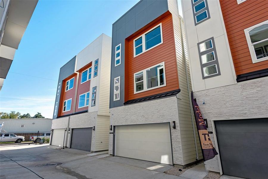 The lovely modern elevation of the home. Unit C is the third home from the left.