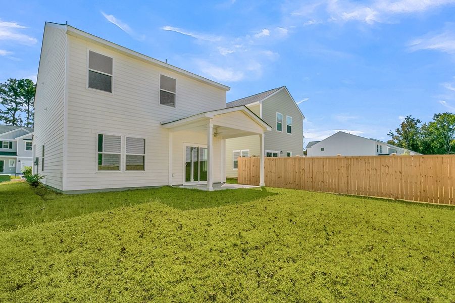 Exterior details and patio area of a home in Central Creek, Goose Creek (Image 28).