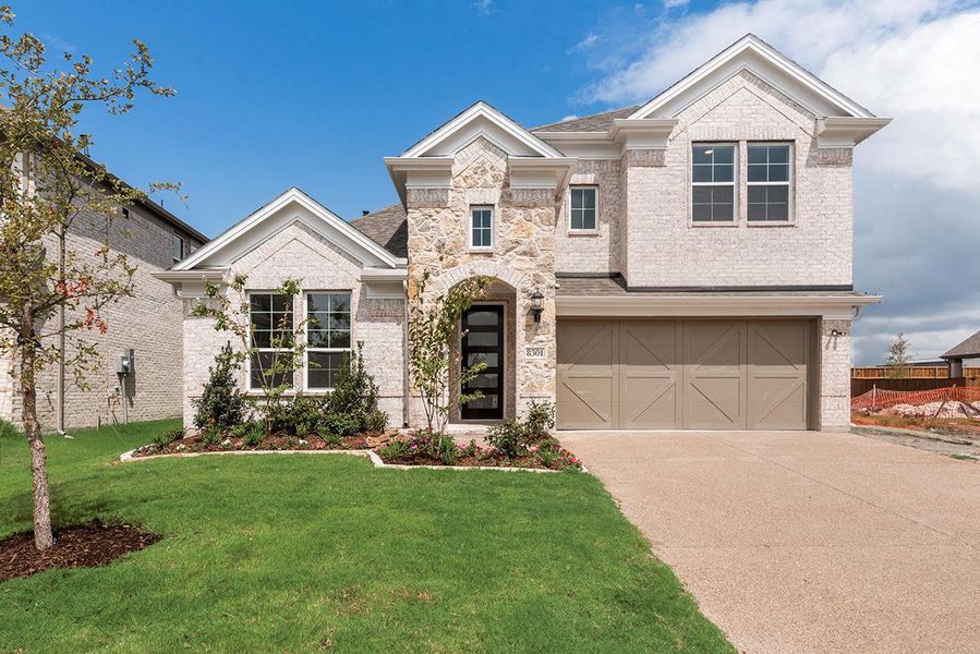 Representative exterior photo of a completed home built from the Grand Whitehall II by Grand Homes in Grand Oaks, Celina, TX (Image 30).
