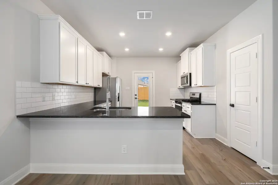 Furnished interior view inside a new home in Hightop Ridge, Converse (Image 7).