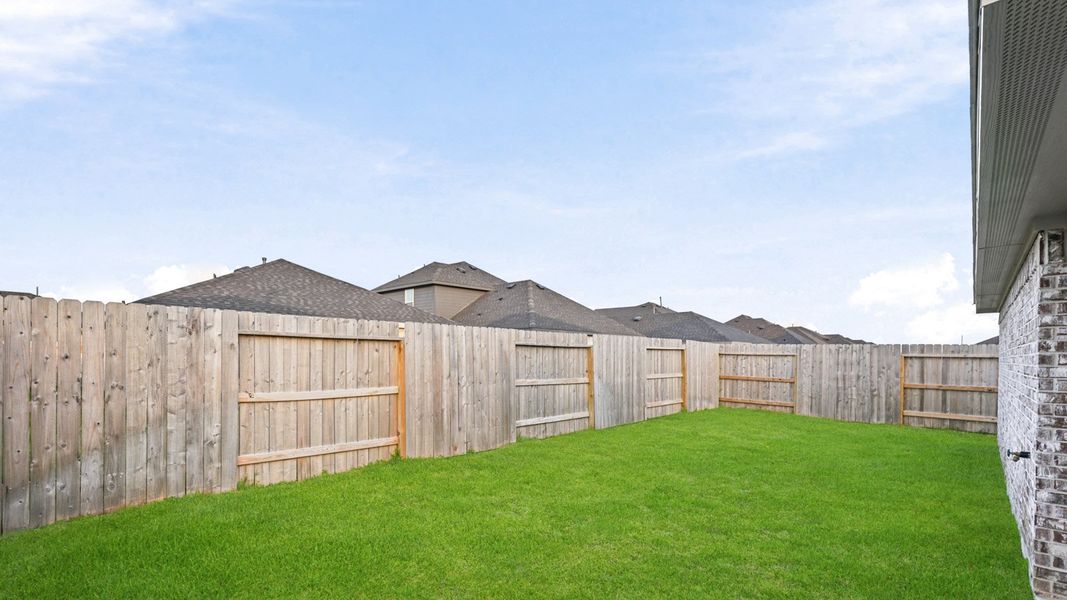 Exterior details and patio area of a home in Sunterra, Katy (Image 3).