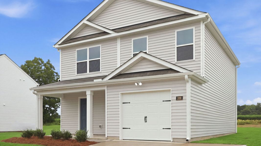 Front exterior of a new home in Hobbs Farm, Ayden, NC, highlighting curb appeal (Image 20). Front exterior of a new home in Hobbs Farm, Ayden, NC, highlighting curb appeal (Image 20).