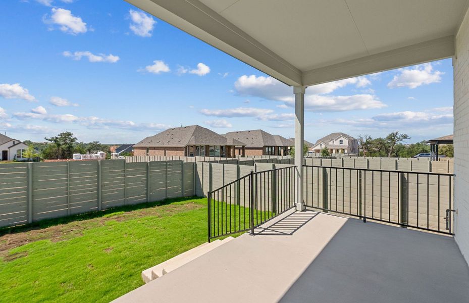 Exterior details and patio area of a home in Wolf Ranch, Georgetown (Image 23).