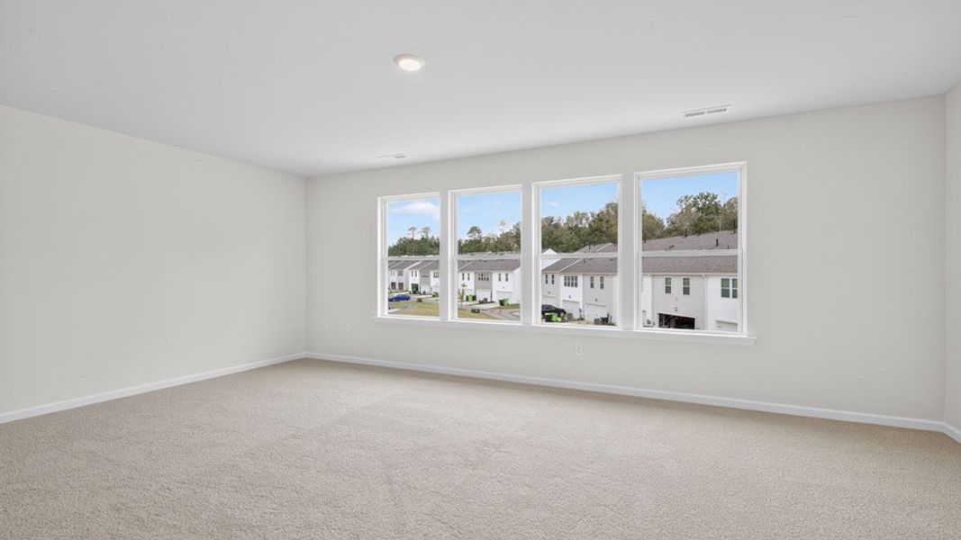 Representative unfurnished interior of a home built from the Blake by D.R. Horton in The Townes at Anderson Farm, Wendell (Image 18).