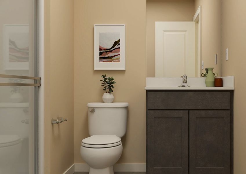 Rendering of a bathroom showing a single-sink vanity next to a toilet and shower. Rendering of a bathroom showing a single-sink vanity next to a toilet and shower.