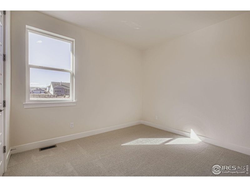 Spacious, unfurnished interior of a new home in RainDance, Windsor (Image 16).