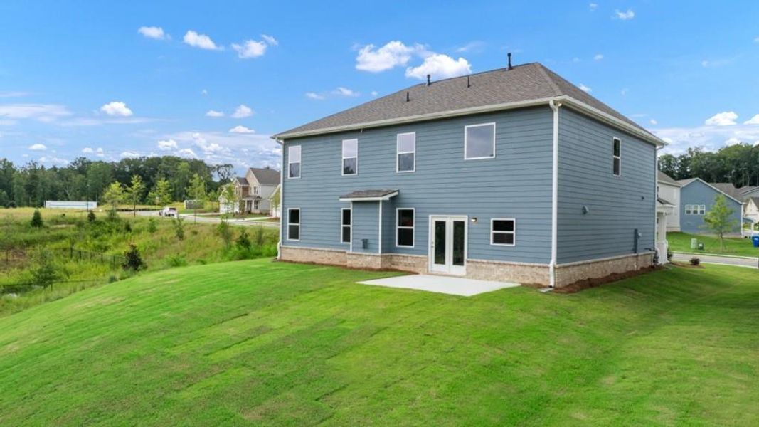 Front exterior of a new home in Butner Estates, South Fulton, GA, highlighting curb appeal (Image 22).