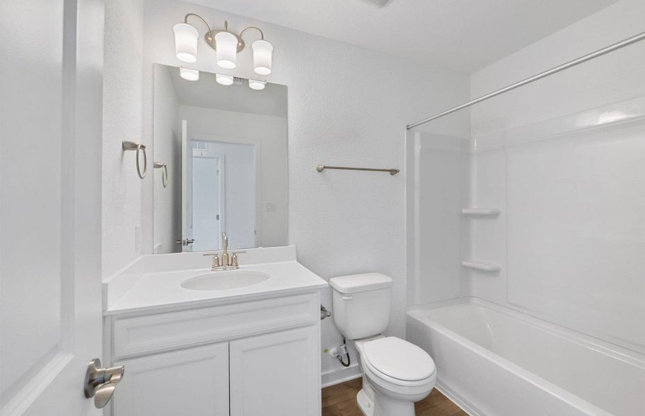 Furnished interior view inside a new home in Santa Rita Ranch, Liberty Hill (Image 6). Furnished interior view inside a new home in Santa Rita Ranch, Liberty Hill (Image 6).