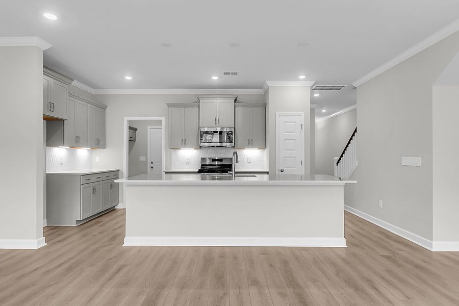 Furnished interior view inside a new home in Pineland Preserve, Summerville (Image 8).
