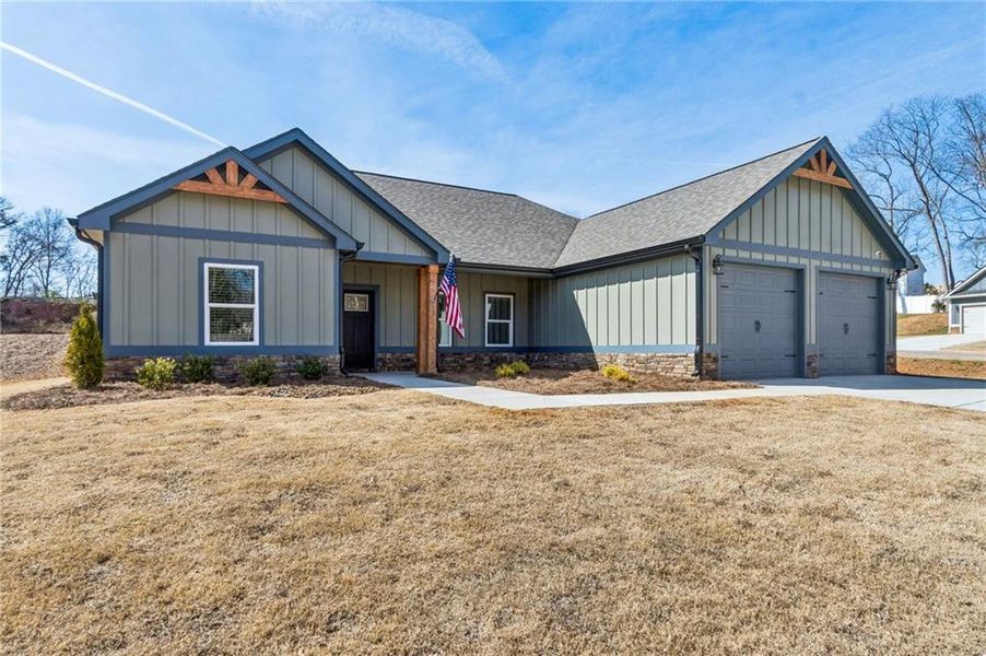 Front exterior of a new home in , Maysville, GA, highlighting curb appeal (Image 24).