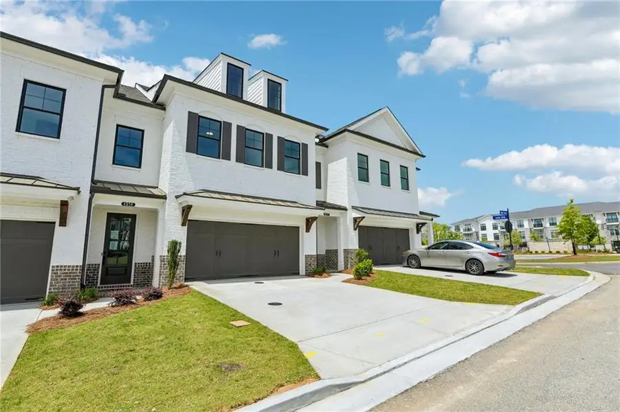 Front exterior of a new home in , Buford, GA, highlighting curb appeal (Image 22).