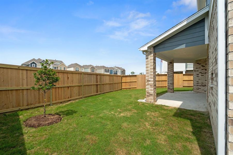 Front exterior of a new home in Meridiana, Iowa Colony, TX, highlighting curb appeal (Image 26). Front exterior of a new home in Meridiana, Iowa Colony, TX, highlighting curb appeal (Image 26).