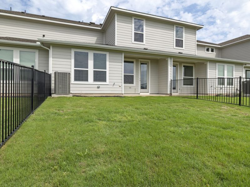 Exterior details and patio area of a home in Avery Centre, Round Rock (Image 3).