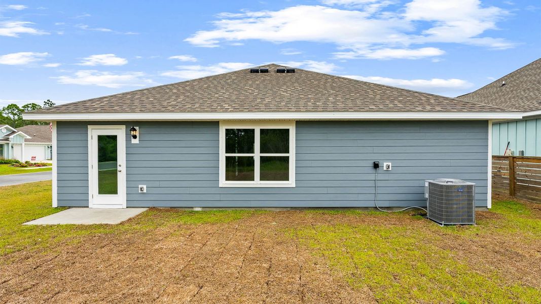 Exterior details and patio area of a home in Palmetto Bluff, Port Saint Joe (Image 18).