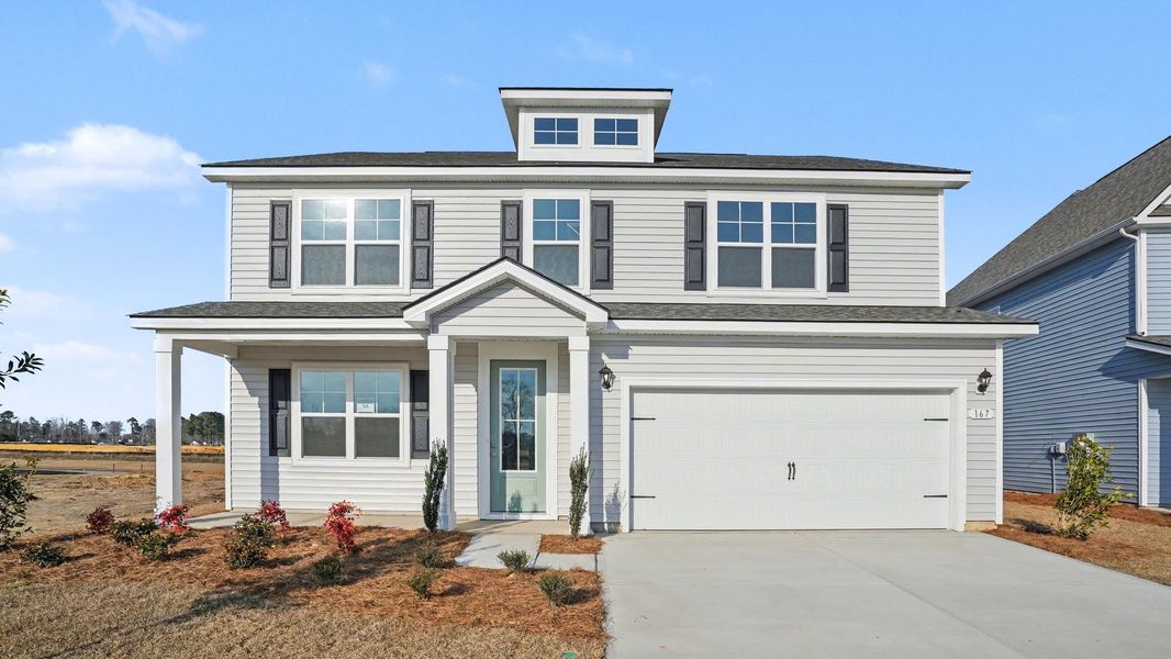 Representative exterior photo of a completed home built from the Tillman by D.R. Horton in Magnolia Farms, Florence, SC (Image 22).