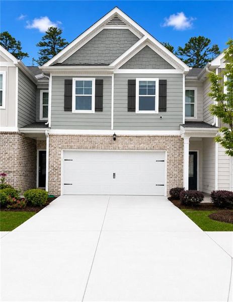Front exterior of a new home in Creekside Village Phase II, Lithonia, GA, highlighting curb appeal (Image 1). Front exterior of a new home in Creekside Village Phase II, Lithonia, GA, highlighting curb appeal (Image 1).