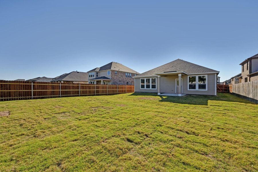 Exterior details and patio area of a home in Salerno - Classic Collection, Round Rock (Image 24).