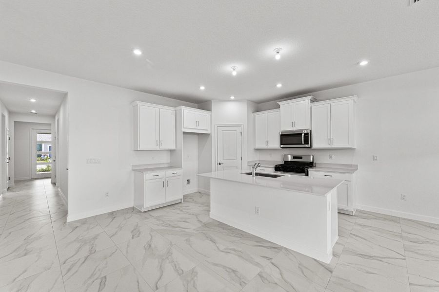 Furnished interior view inside a new home in Tradition - Cadence, Port St. Lucie (Image 7).