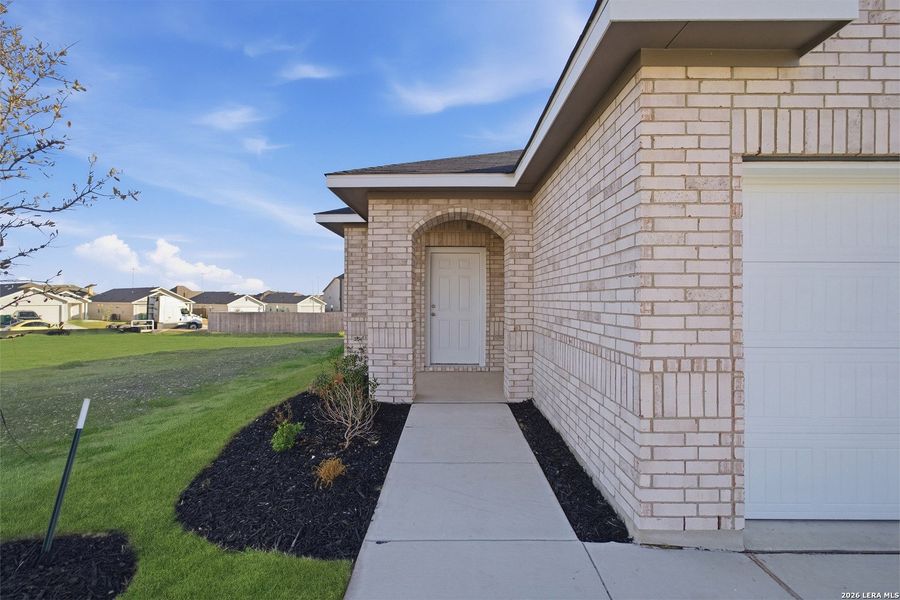 Exterior details and patio area of a home in Willow View, Converse (Image 3).