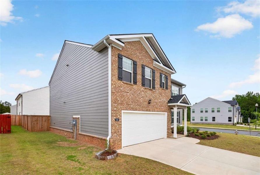 Front exterior of a new home in Bailey Glynn, Covington, GA, highlighting curb appeal (Image 20).