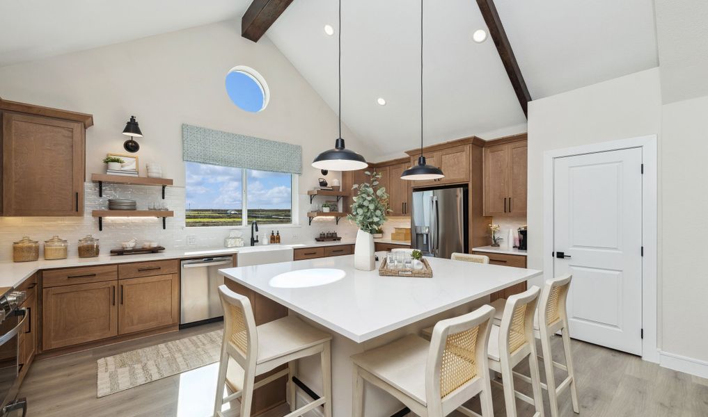 Kitchen with pendant lighting and floating shelves