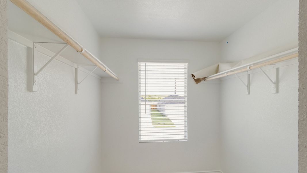 Representative unfurnished interior of a home built from the The Franklin by D.R. Horton in Watermill, Uhland (Image 10).