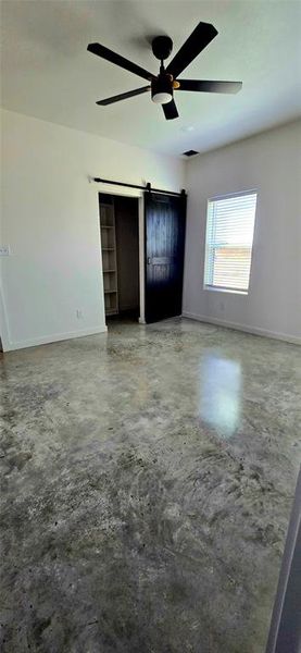 Primary bedroom with walk in closet