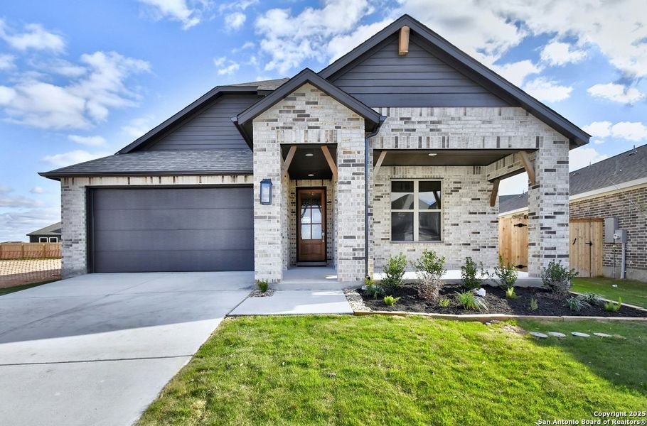 Front exterior of a new home in Alsatian Oaks: 50ft. lots, Castroville, TX, highlighting curb appeal (Image 25). Front exterior of a new home in Alsatian Oaks: 50ft. lots, Castroville, TX, highlighting curb appeal (Image 25).